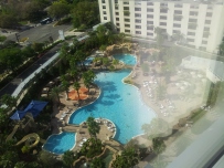 The view from our room, sixteen floors up, down to the gigantic pool.